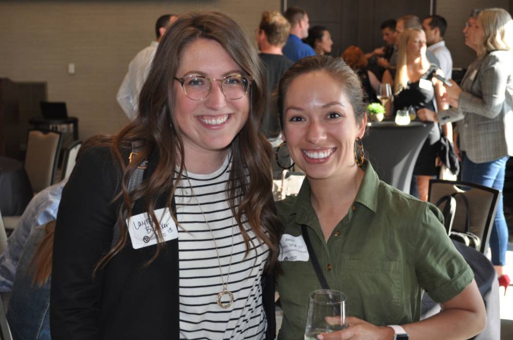 two women at young alumni event